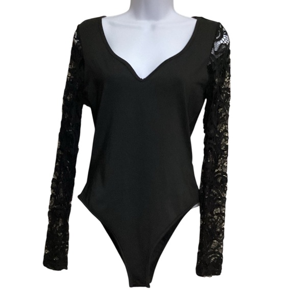 Black Asymmetrical Cut Out Bodysuit - Picture 1 of 7